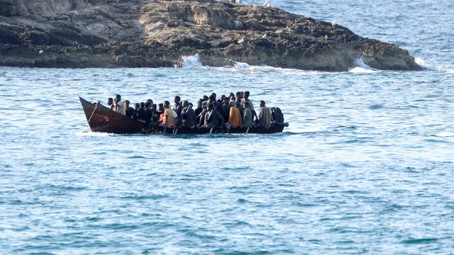 FILE PHOTO: Migrants on Lampedusa