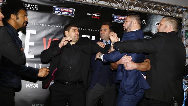 David Haye and Tony Bellew clash after the press conference as promoter Eddie Hearn looks on