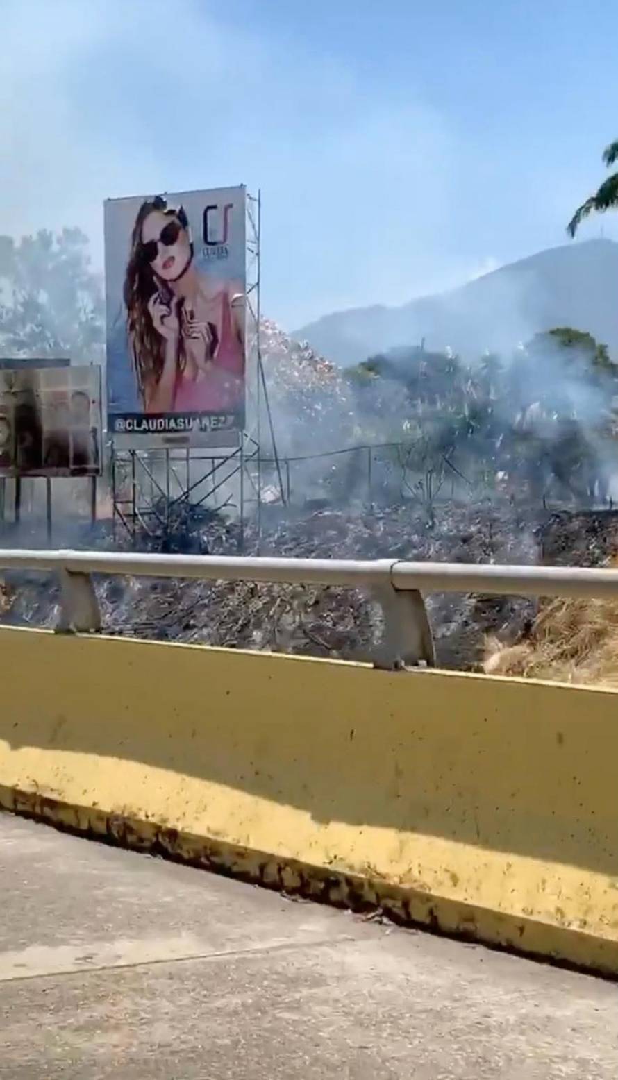 Smoke is seen during a protest in Caracas