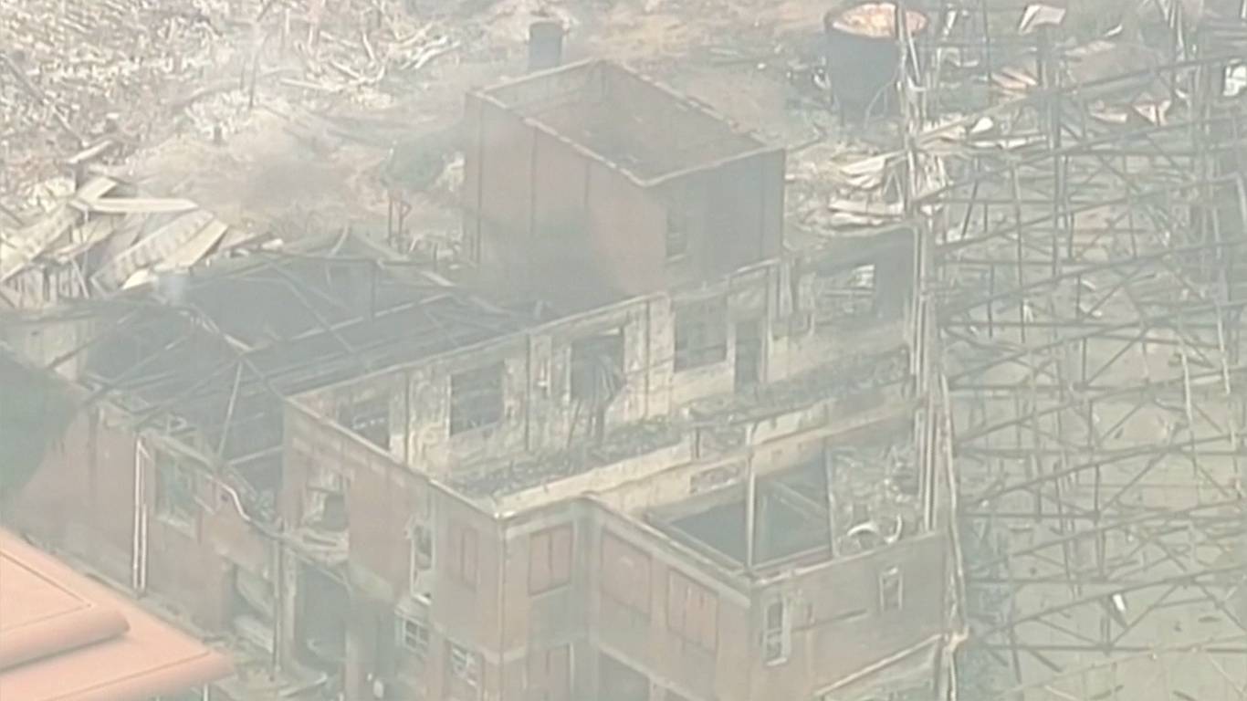 Aerial view of a destroyed three-storey building in Batlow