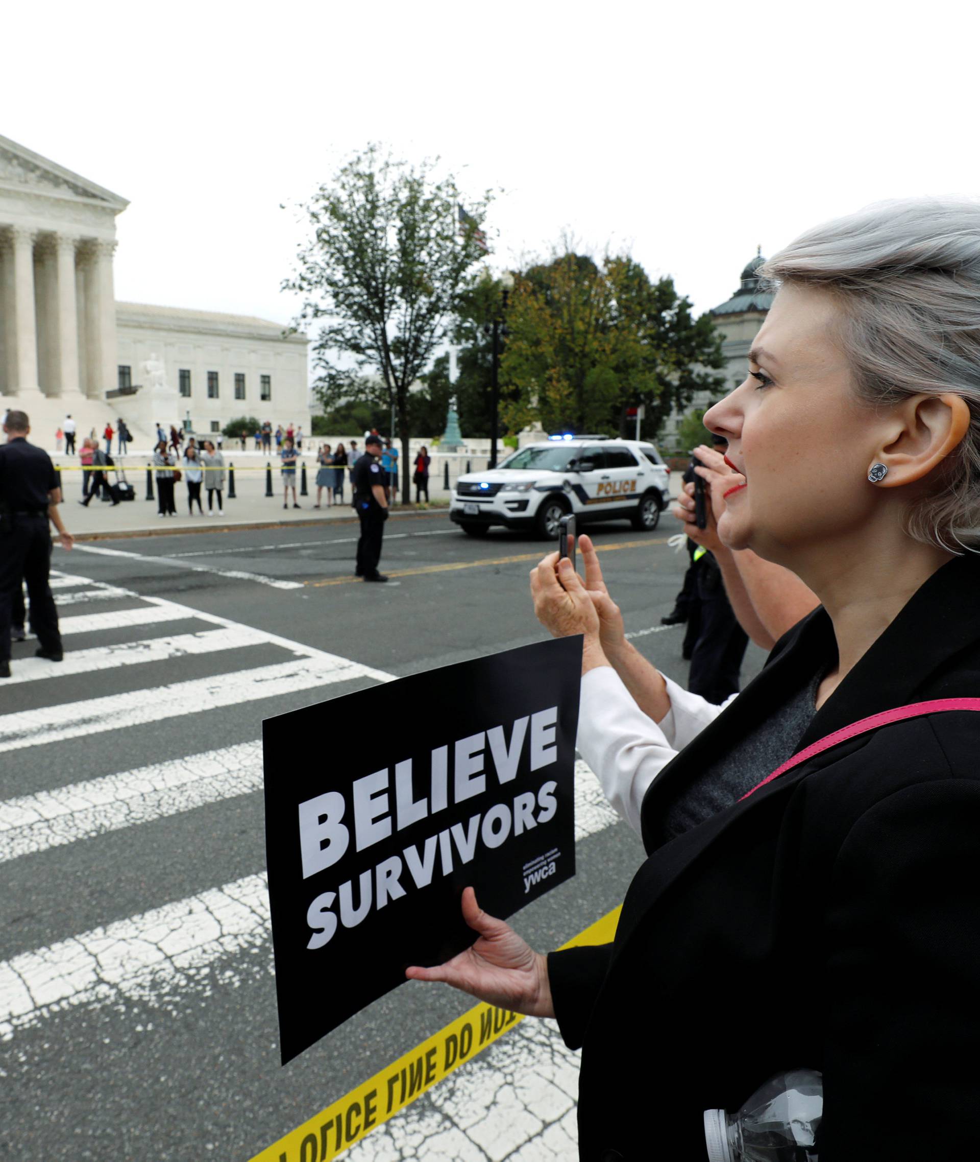 Protestors chant and are arrested demonstrating against the confirmation of U.S. Supreme Court nominee Kavanaugh in front of the  Supreme Court building on Capitol Hill in Washington