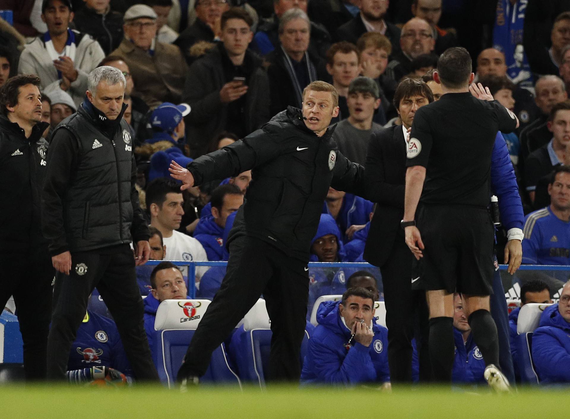 Manchester United manager Jose Mourinho and Chelsea manager Antonio Conte clash