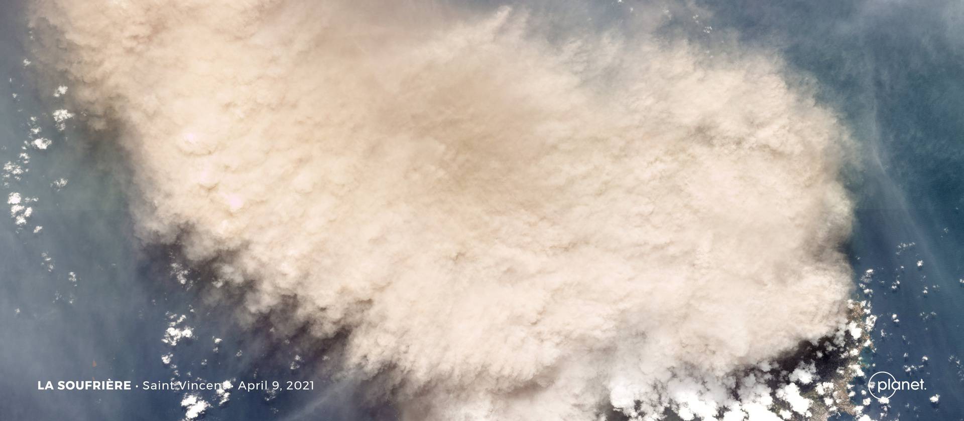 Ash cloud almost completely obscures the island of Saint Vincent after La Soufriere Volcano erupted explosively on the morning of April 9, 2021, in this Planet Labs handout satellite image