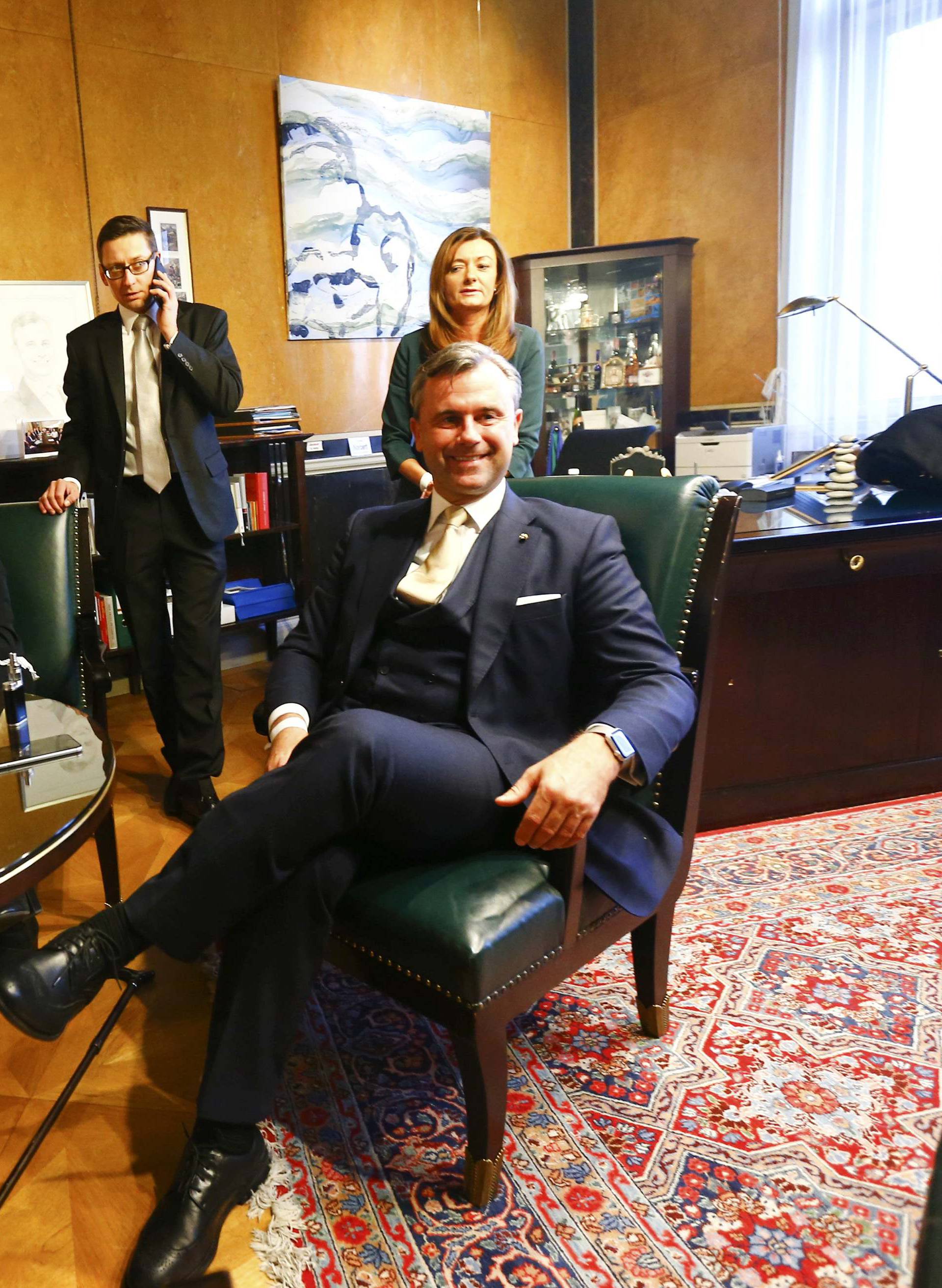 Austrian far-right Freedom Party (FPOe) presidential candidate Hofer and his wife wait for the first projections in his office in Vienna