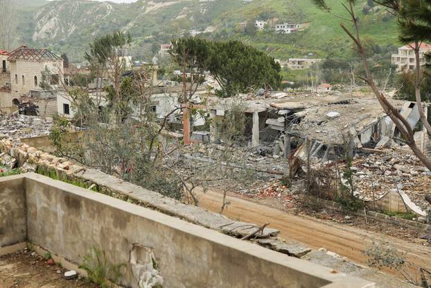 Scenes of destruction in the village of Debbine