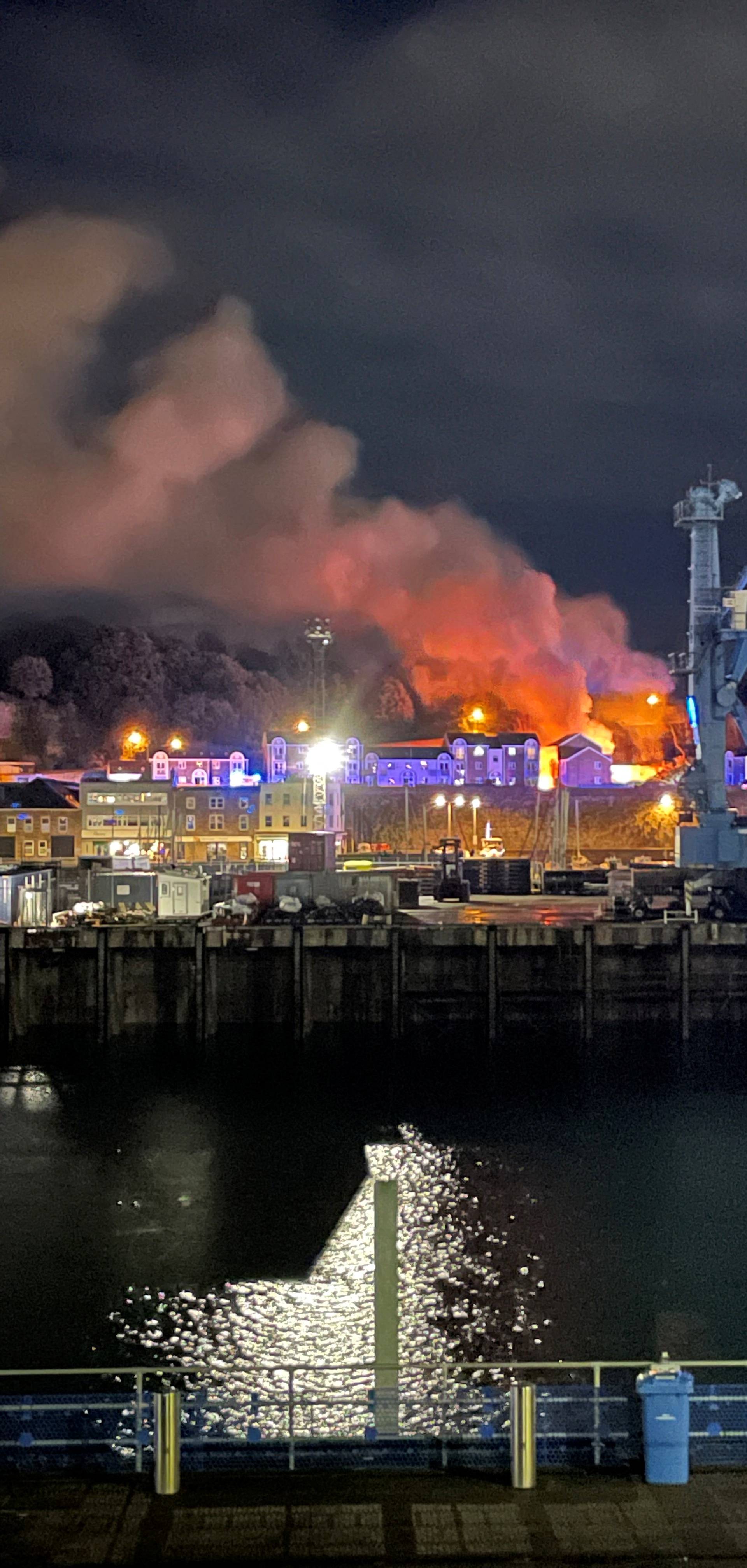 A general view of fire and smoke in Saint Helier following an explosion on the island of Jersey