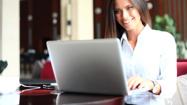 Shot of an attractive mature businesswoman working on laptop in her workstation.