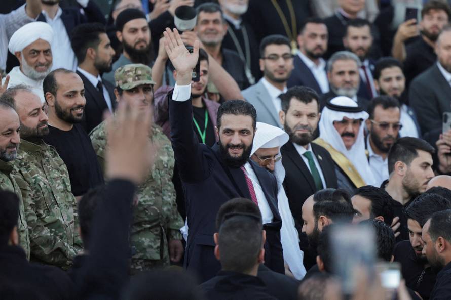 FILE PHOTO: Syria’s interim President Ahmed al-Sharaa attends the “Aleppo, Key to Victory” celebration  in Aleppo