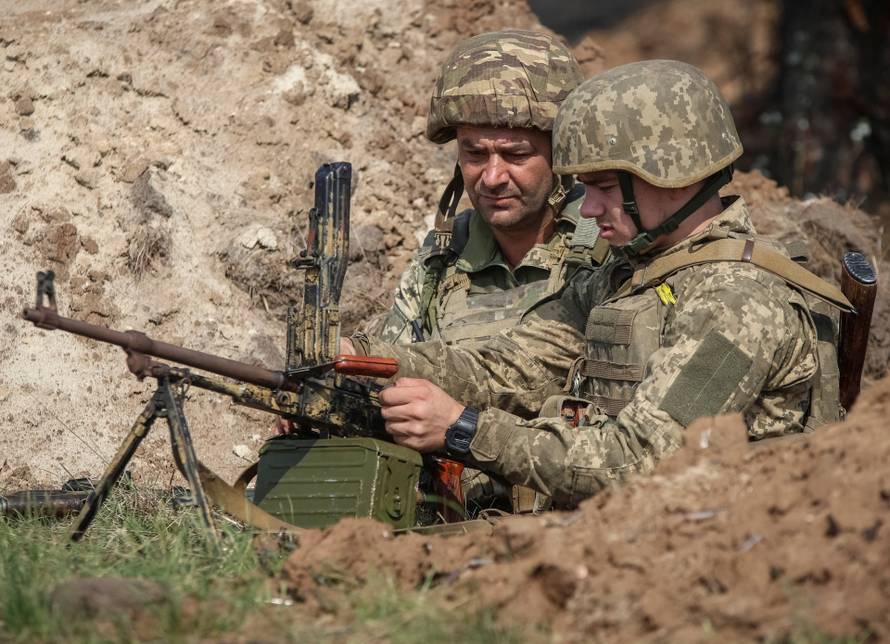 Ukrainian servicemen attend a training between combat missions at a training ground in Kharkiv region