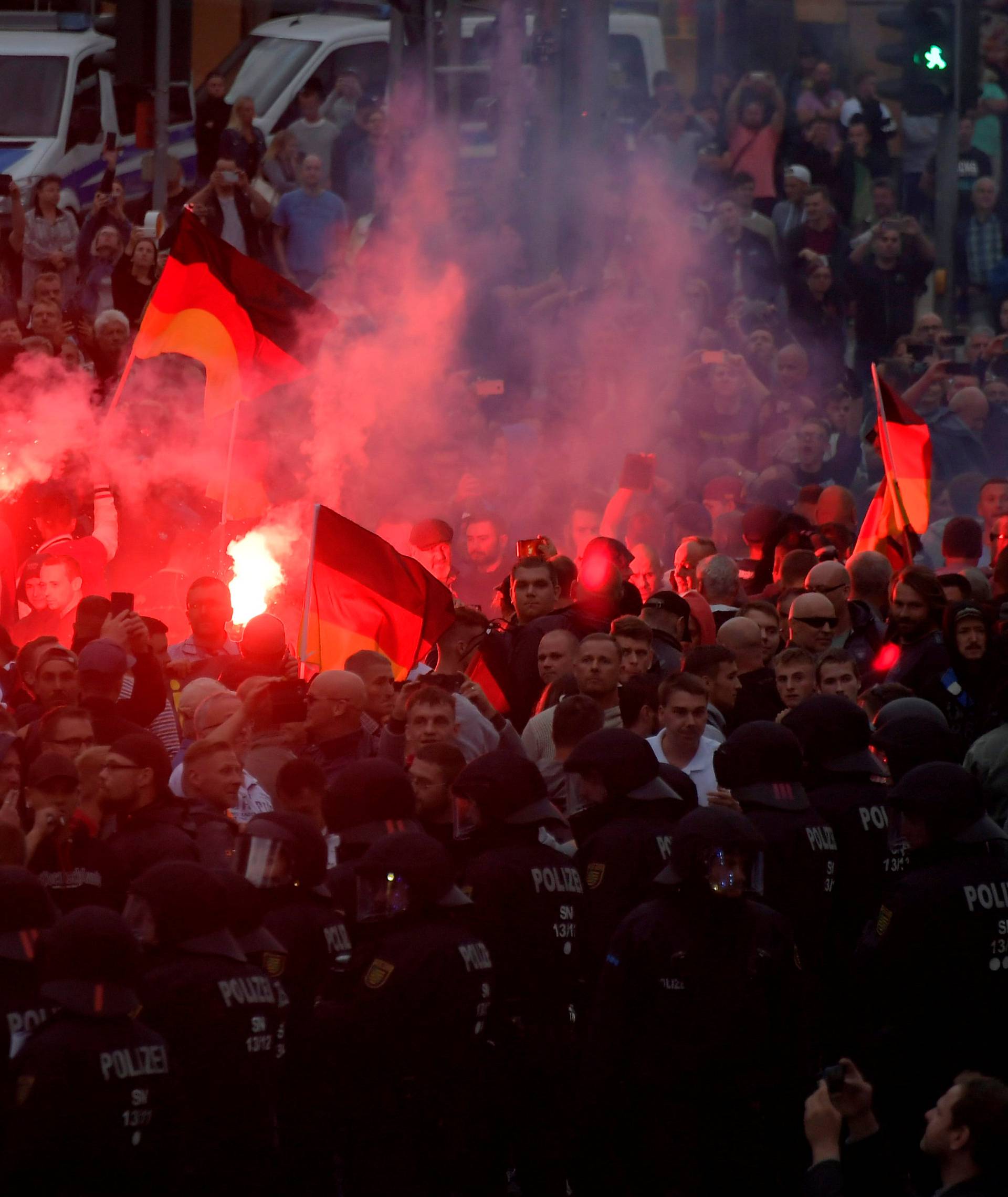 Right-wing supporters protest after a German man was stabbed last weekend in Chemnitz