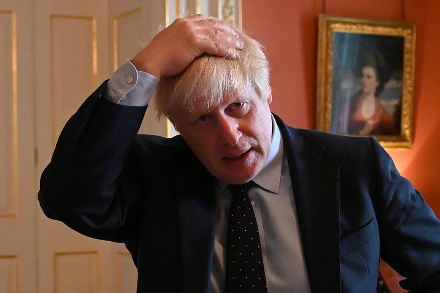 Britain's Prime Minister Boris Johnson meets with NHS workers inside 10 Downing Street in London