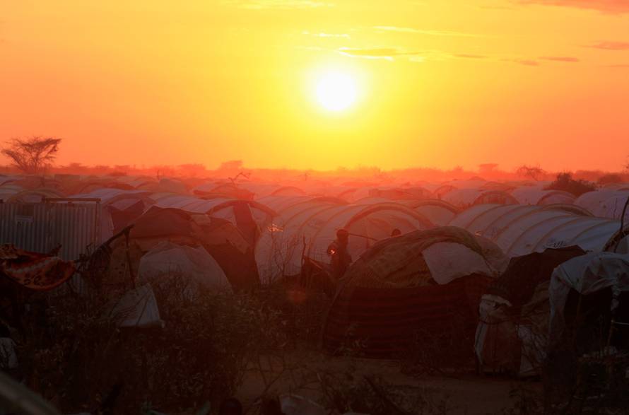 FILE PHOTO: The sun sets over the Ifo extension refugee camp in Dadaab, near the Kenya-Somalia border, in Garissa County