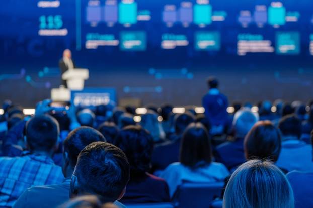 Focused,Audience,At,A,Conference,Listening,To,A,Speaker,On