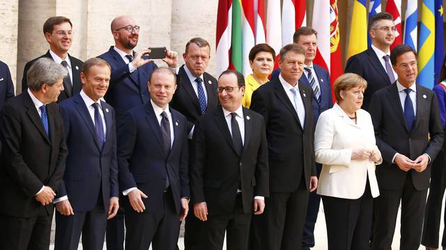 European Union leaders pose for a family photo during a meeting on the 60th anniversary of the Treaty of Rome