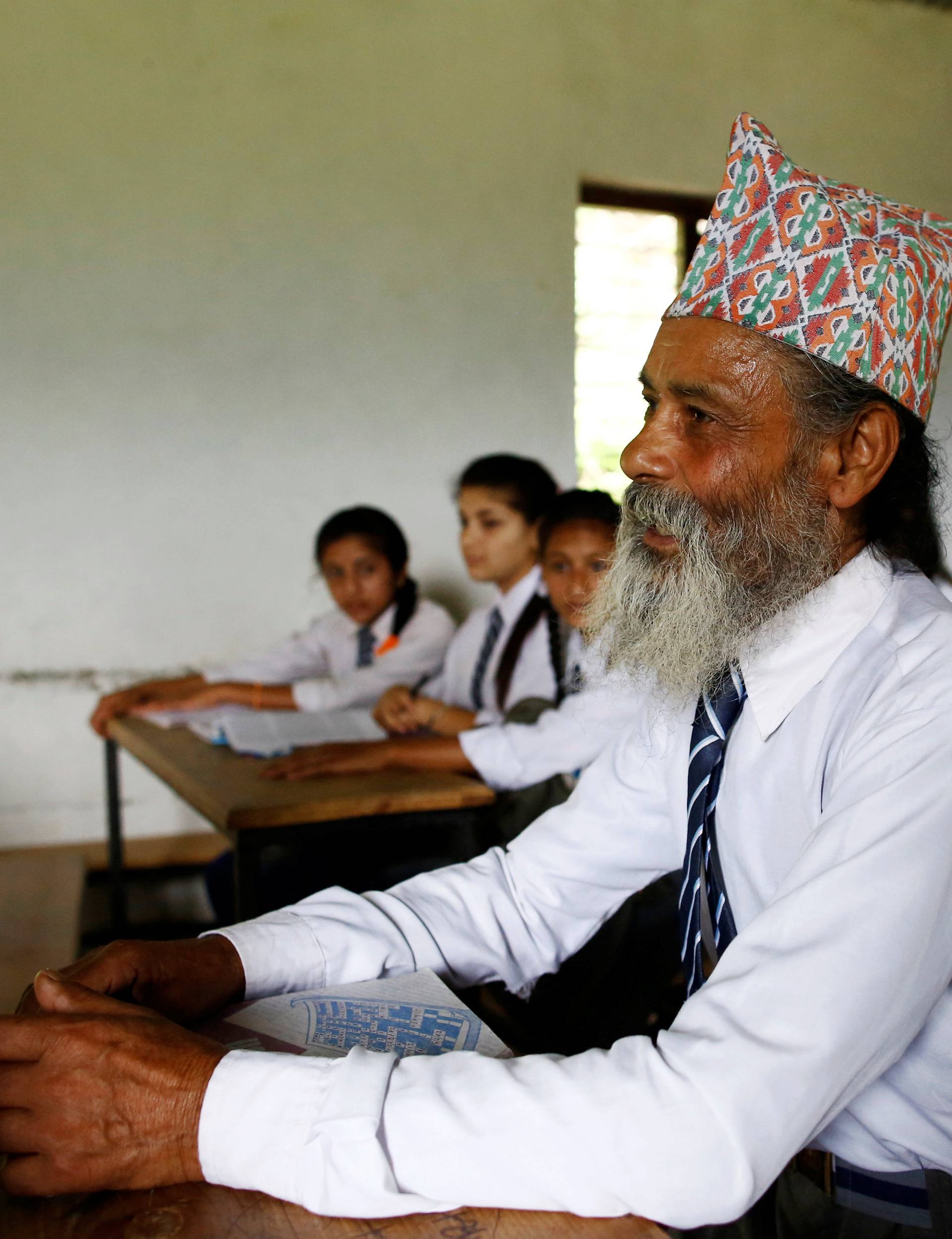 The Wider Image: Nepal's 68-year-old student