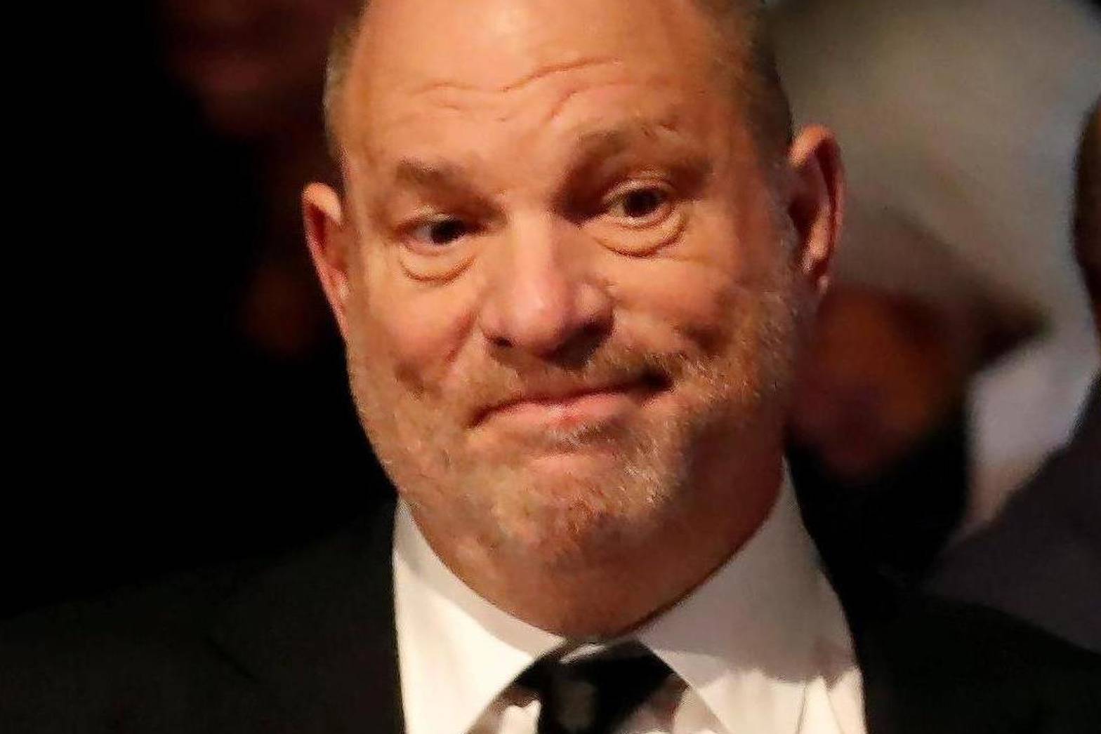 FILE PHOTO: Producer Weinstein stands in the audience ahead of the first presidential debate between U.S. presidential nominee Donald trump and U.S. presidential nominee Clinton in Hempstead