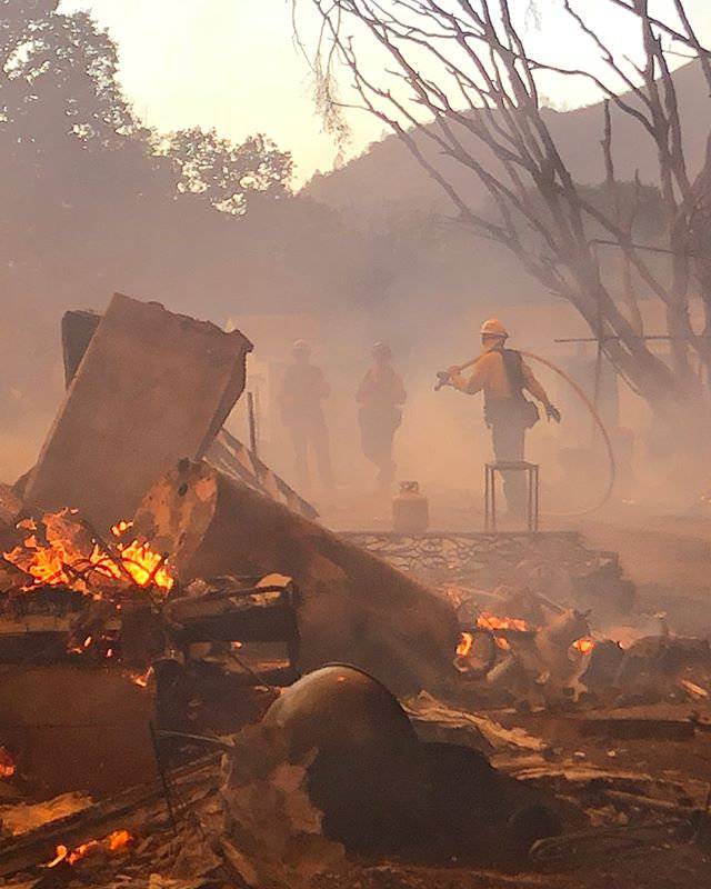 Firefighters work to battle a wildfire in an area near Mendocino National Forest, California