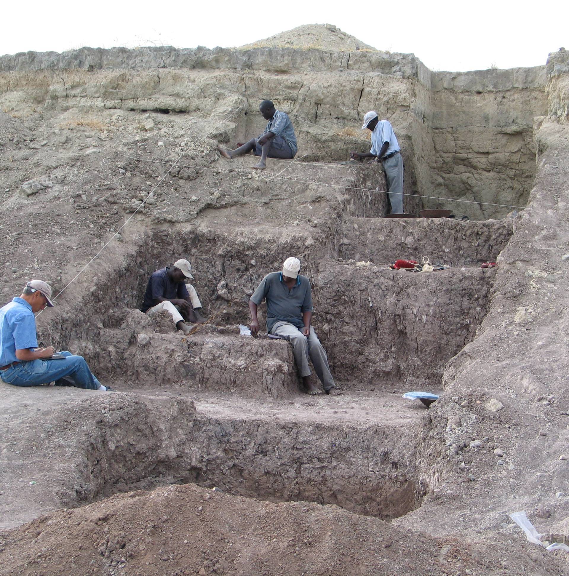 Smithsonian researchers are seen at the Olorgesailie Basin excavation site in southern Kenya