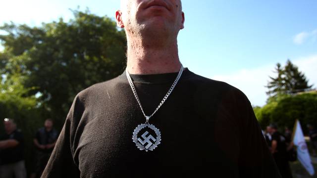 An activist of a new Hungarian extreme right group attends the launch of their new movement, to be called Force and Determination, at a rally in Vecses