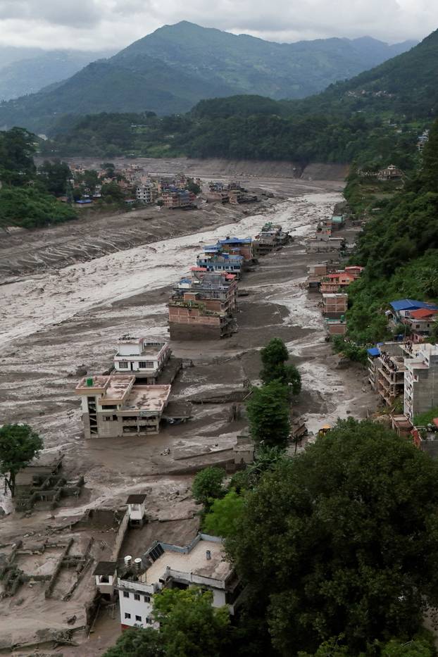 A drove view of damaged properties following a flash flood at Trishuli, Nepal