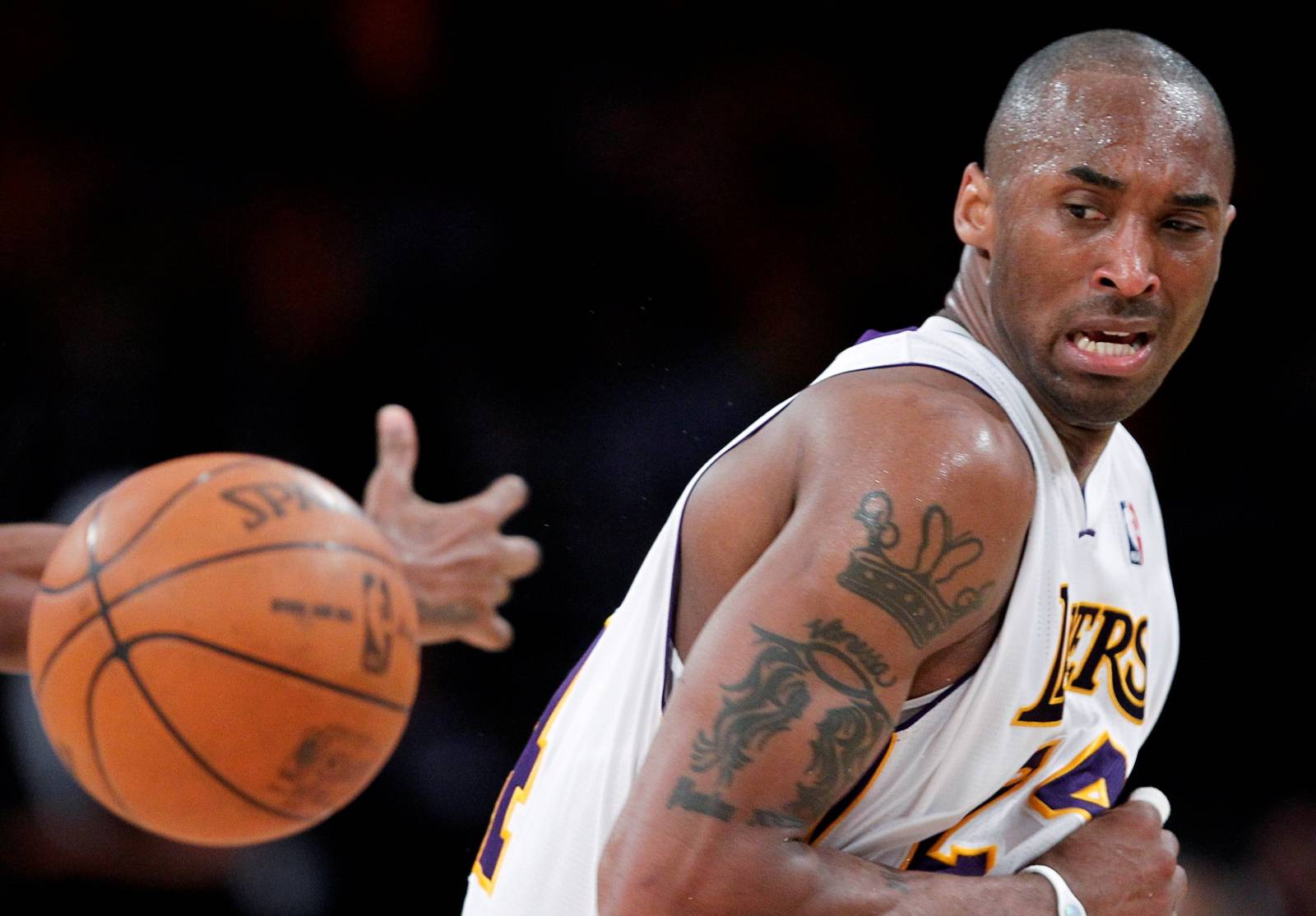 FILE PHOTO: Lakers' Bryant loses control of the ball during Game 1 of their NBA Western Conference game against the Hornets in Los Angeles