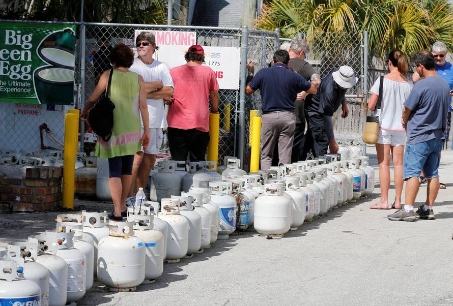 Residents wait in line to purchase propane gas ahead of Hurricane Irma's expected arrival in Boca Raton