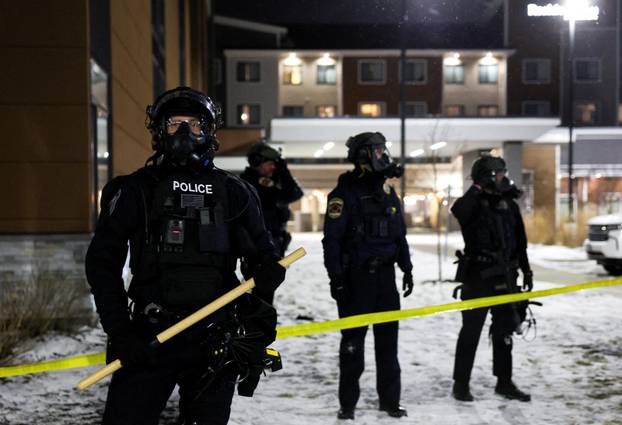 Protest outside the hotel where Bovino, who has been removed from his role, is reportedly staying, in Maple Grove
