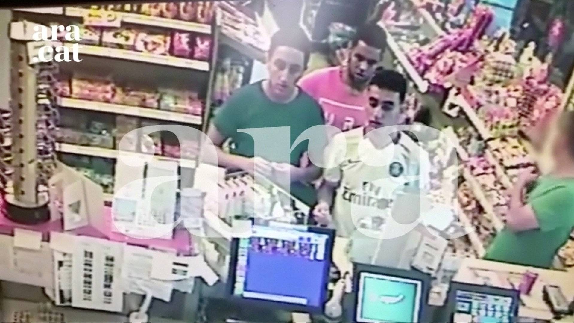 Three attackers who were shot dead in Cambrils on the night of the attack in Barcelona last week are caught on a petrol station's surveillance camera close to the town just hours before the attack, in this still frame taken from video