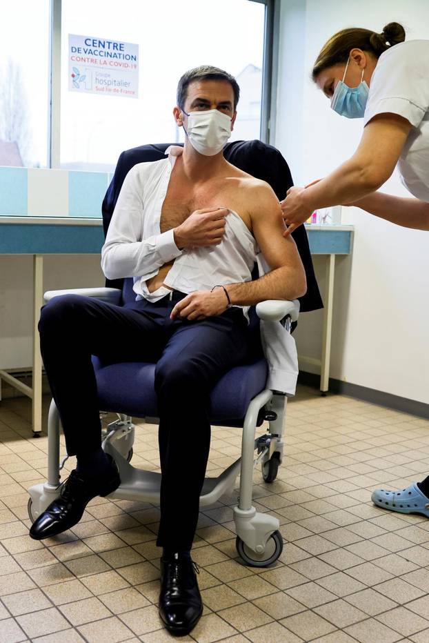 French Health Minister Veran receives a dose of the AstraZeneca-Oxford COVID-19 vaccine, in Melun