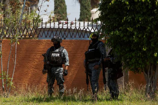 Mourners attend funeral for body believed to be ‘El Mencho’, in Zapopan