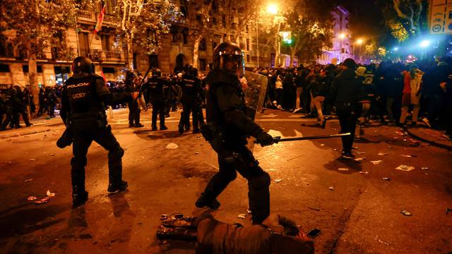 Protest after Spain's socialists reached a deal with the Catalan separatist Junts party for government support, in Madrid