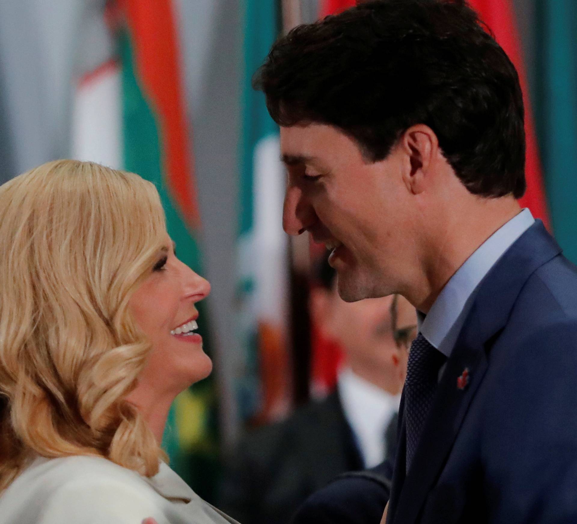 Canadian Prime Minister Trudeau talks with Croatia's President Grabar-Kitarovic during working luncheon at the 73rd session of the United Nations General Assembly at U.N. headquarters in New York