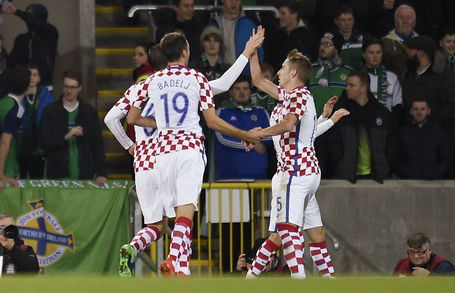 Croatia's Duje Cop celebrates scoring their second goal with teammates