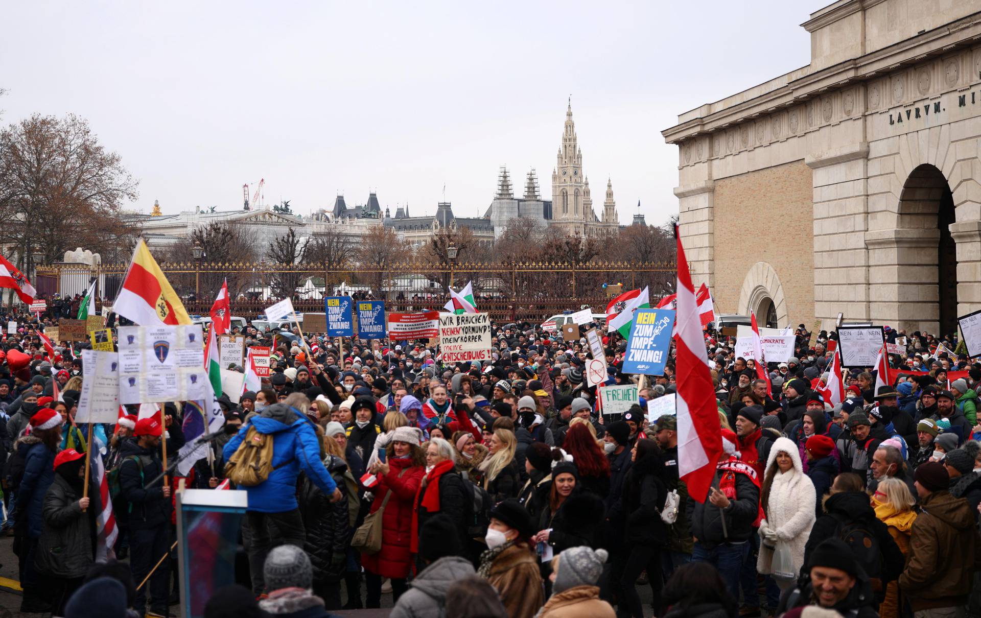 Thousands of people march to protest against restrictions on public life to curb the coronavirus pandemic