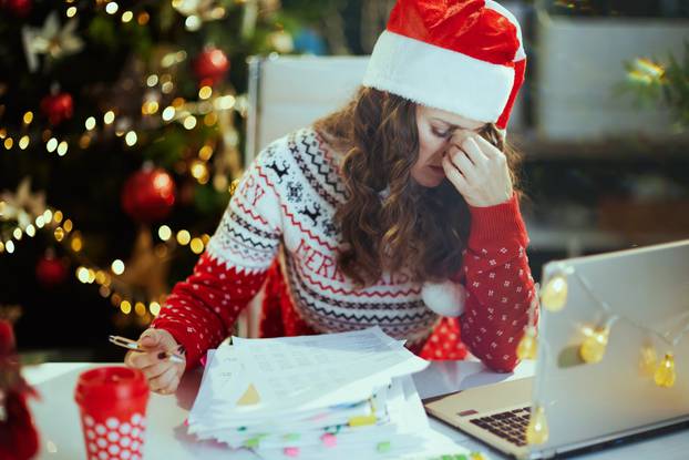 Christmas,Time.,Stressed,Stylish,Middle,Aged,Business,Woman,In,Santa