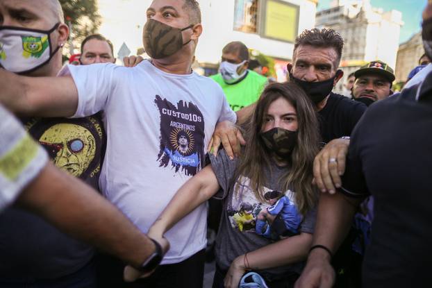 Argentines protest to demand justice after the death of soccer legend Diego Armando Maradona, in Buenos Aires