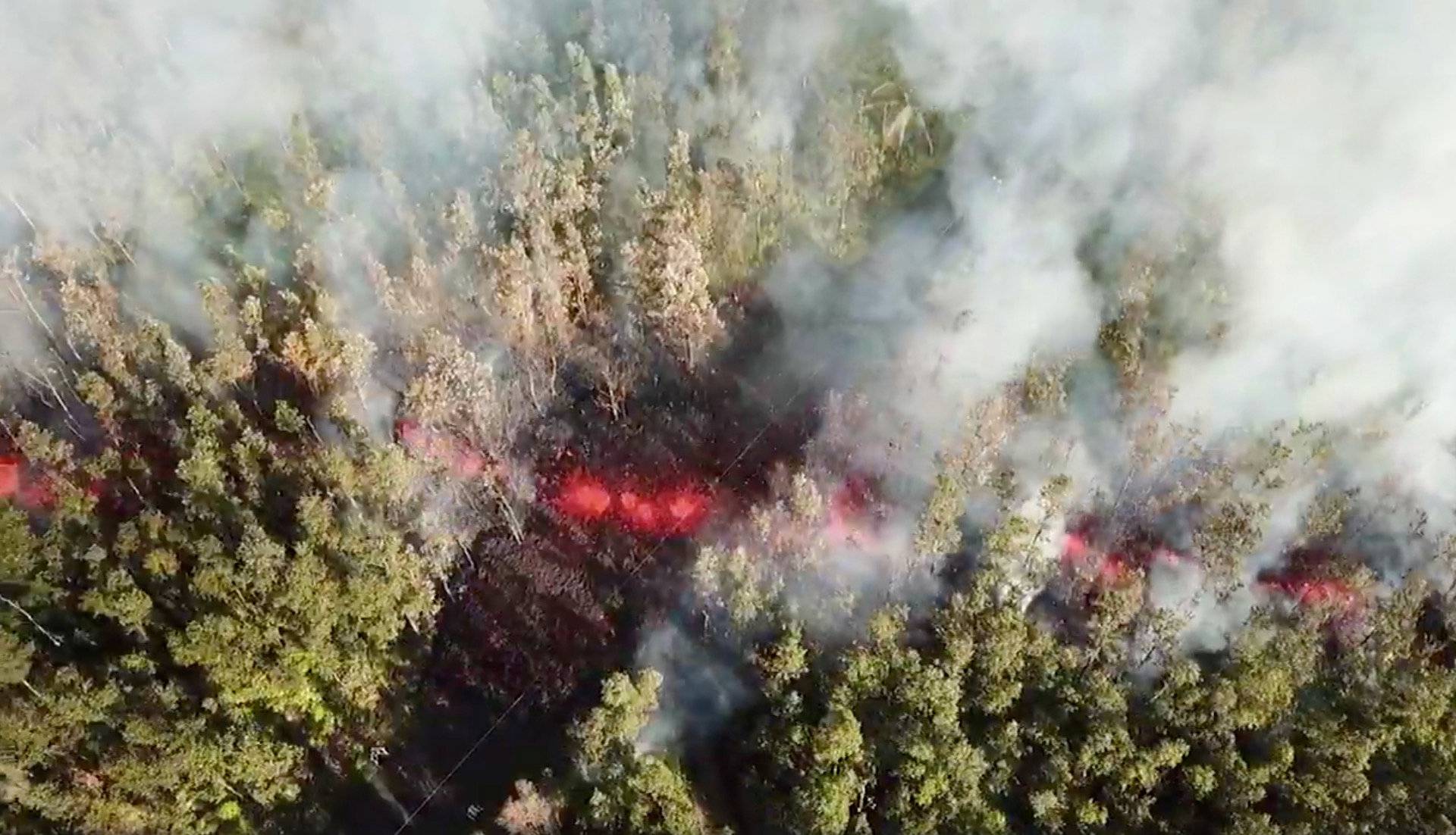 Lava emerges from the ground after Kilauea Volcano erupted, on Hawaii's Big Island