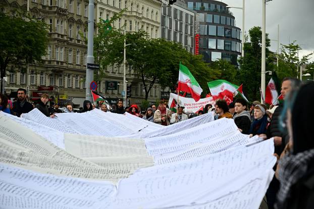 People attend a protest against Israel's participation in the Eurovision Song Contest, in Vienna