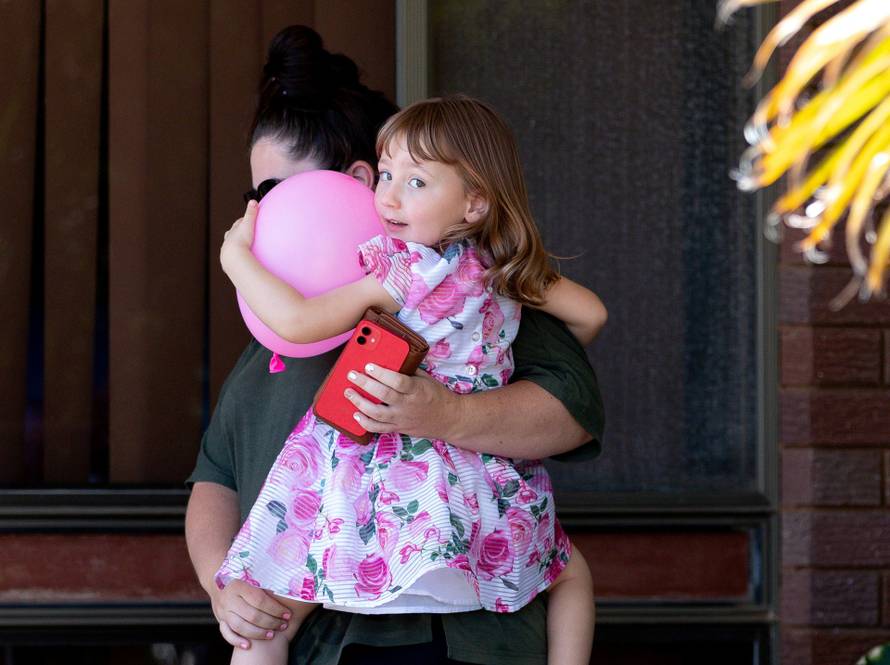 Cleo Smith and her mother leave a house where the girl spent her first night after being rescued in Carnarvon