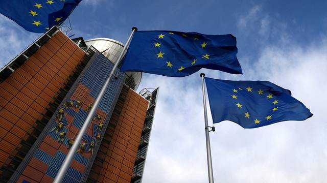 FILE PHOTO: FILE PHOTO: European Union flags flutter outside the EU Commission headquarters in Brussels, Belgium