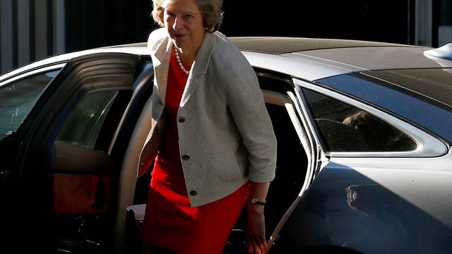 Britain's Prime Minister Theresa May arrives at Downing Street in London