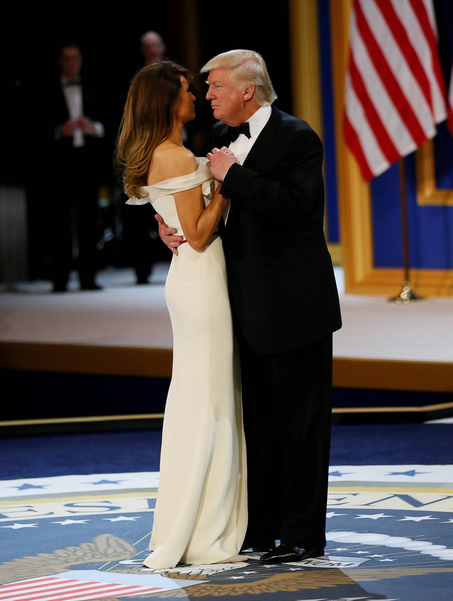 U.S. President Donald Trump and his wife first lady Melania Trump dance at the "Salute to Our Armed Forces" inaugural ball during inauguration festivities in Washington