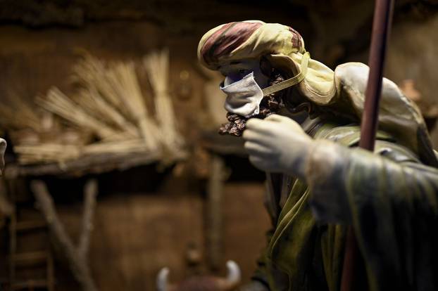 Turin. The crib in the cathedral with the characters with the mask for the Covid19 emergency