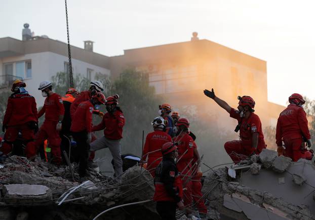 Rescue operations take place on a site after an earthquake struck the Aegean Sea, in the coastal province of Izmir