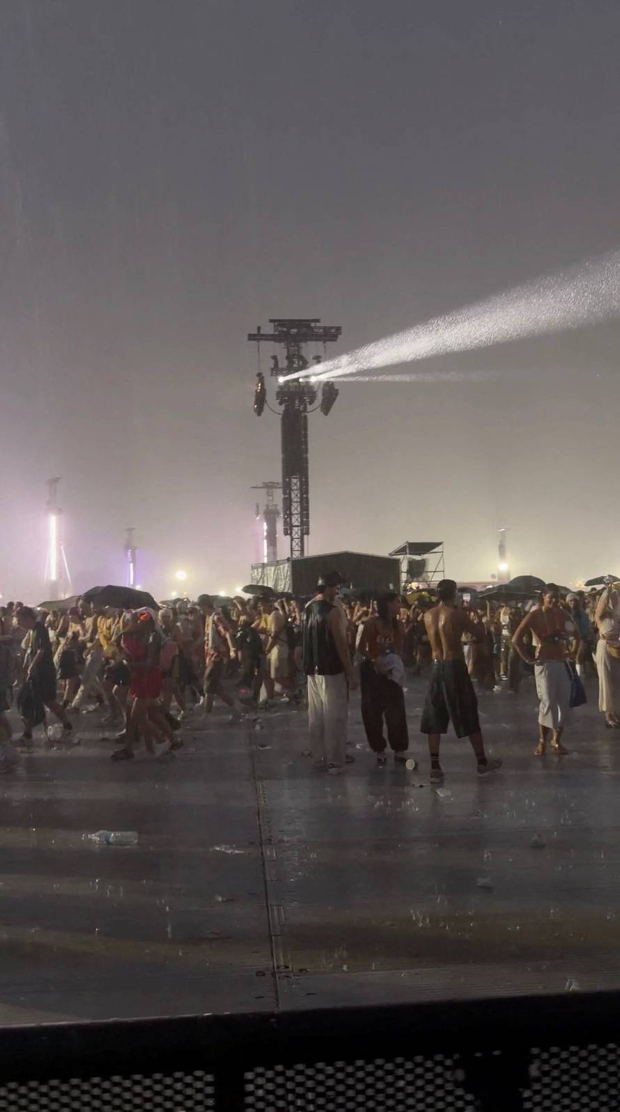People evacuate from Bad Bunny's concert due to a hailstorm, in Milan