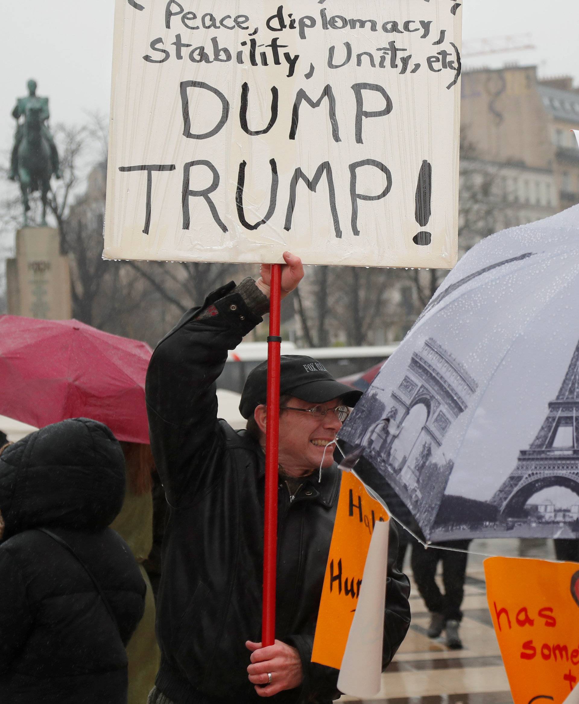 People gather at the Trocadero square to protest against U.S. President Donald Trump and for equal rights in Paris