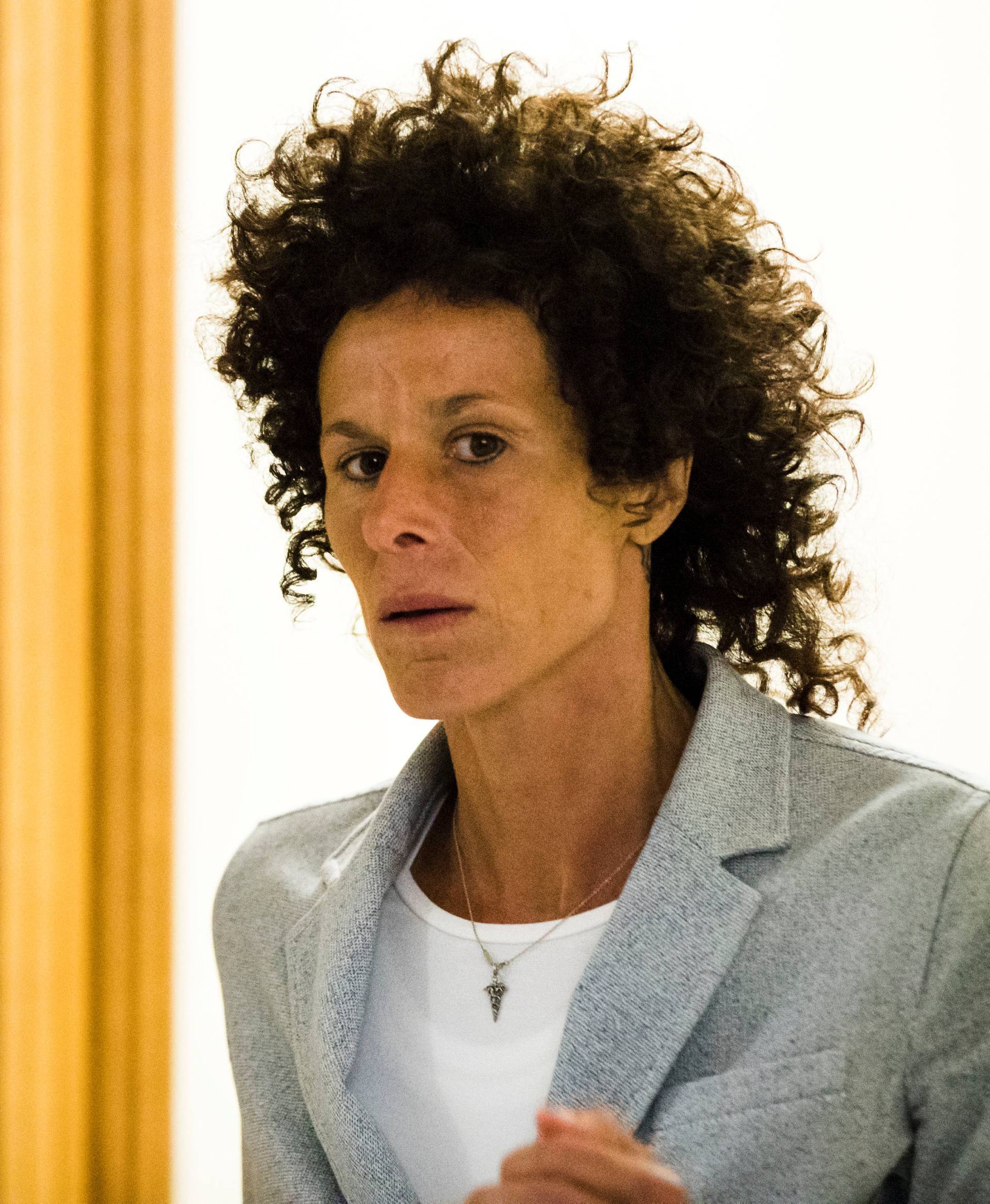 Andrea Constand walks from the courtroom after testifying at Bill Cosby's sexual assault trial at the Montgomery County Courthouse in Norristown
