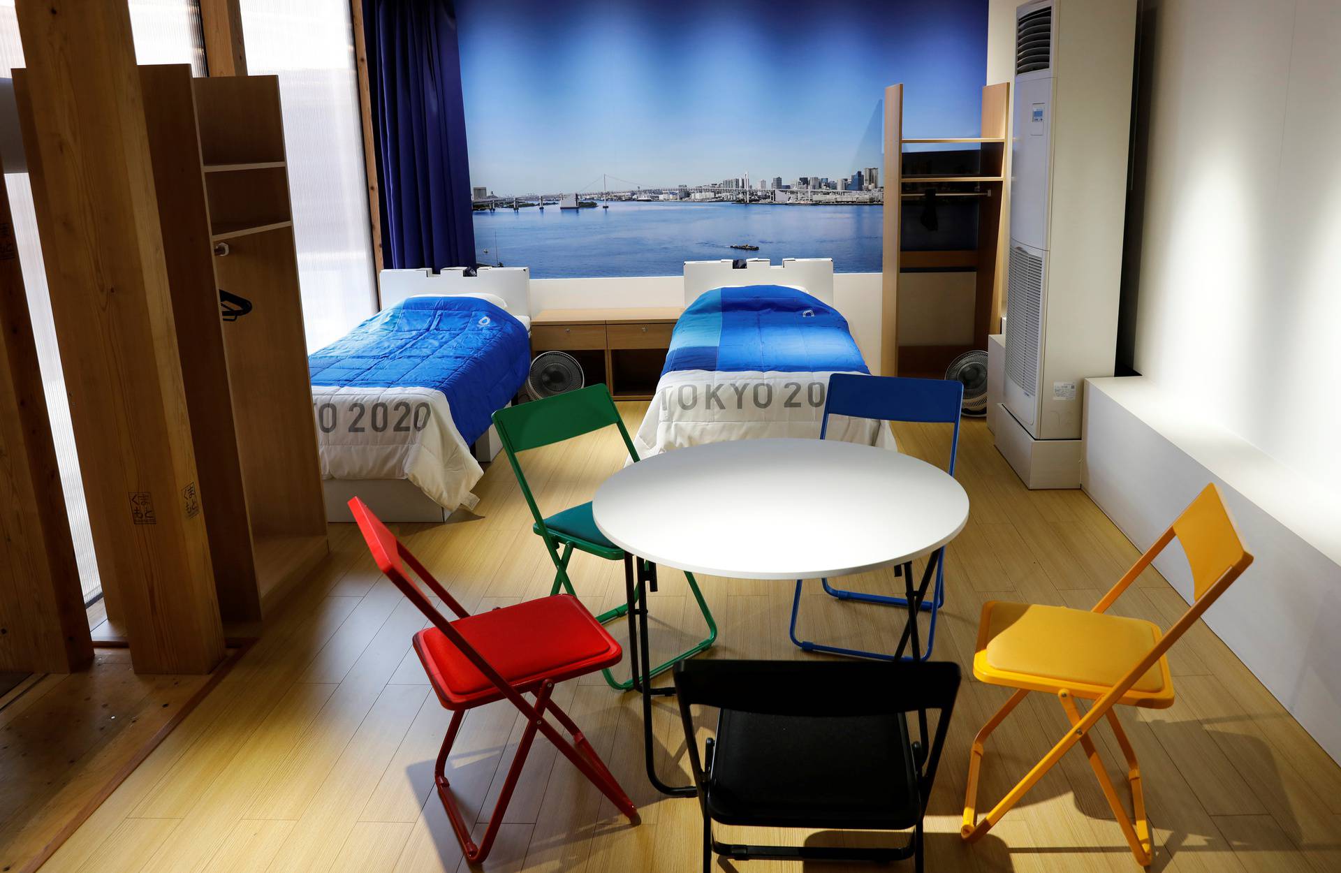 A replica of ahtletes' room is displayed at the village plaza of the Tokyo 2020  Olympic and Paralympic Village  in Tokyo