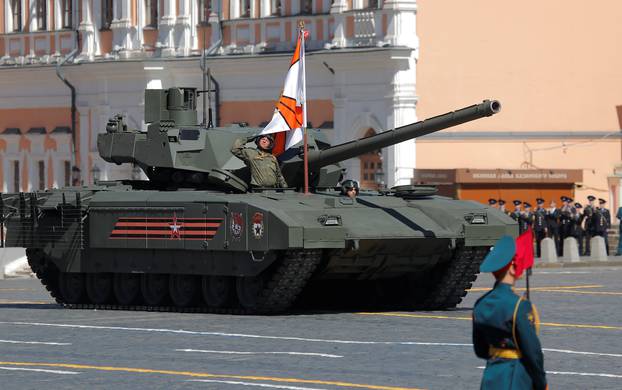 Russian servicemen drive a T-14 Armata tank during the Victory Day paradeat Red Square in Moscow