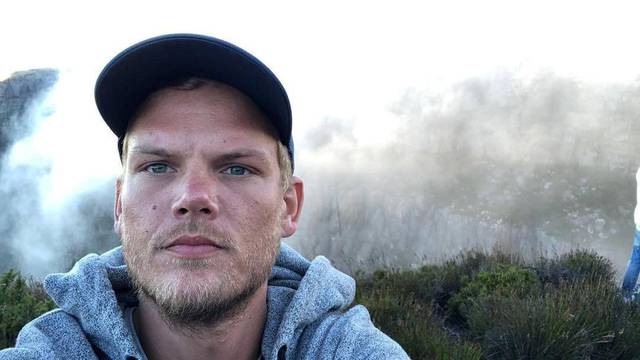 Swedish musician, DJ, remixer and record producer Avicii takes a selfie on Table Mountain